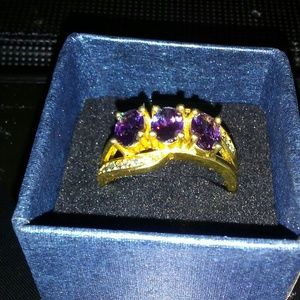 Purple ring w/3 stones